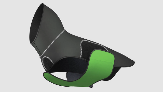 3D still image of a black modular dog raincoat with a green removable belly wrap attaching and detaching.